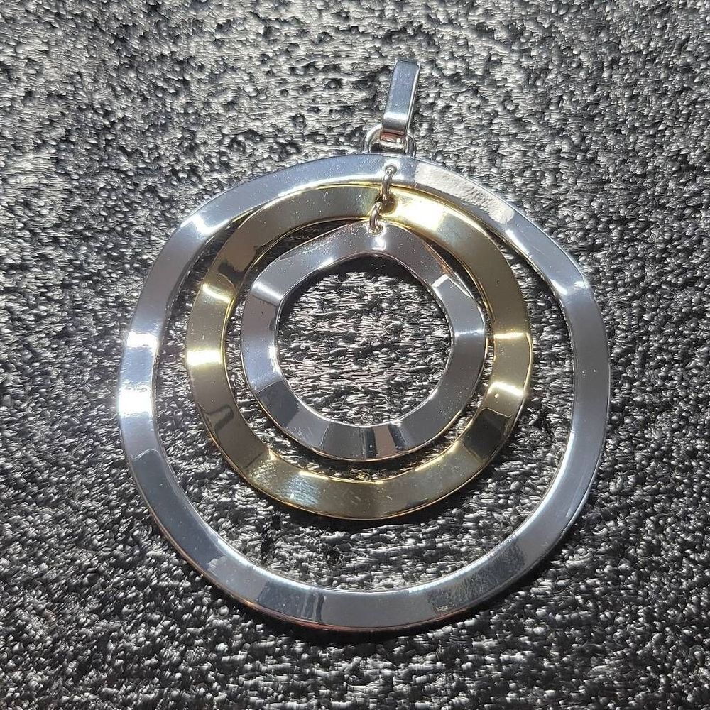 Signed Vintage silver and gold pendant by Best
